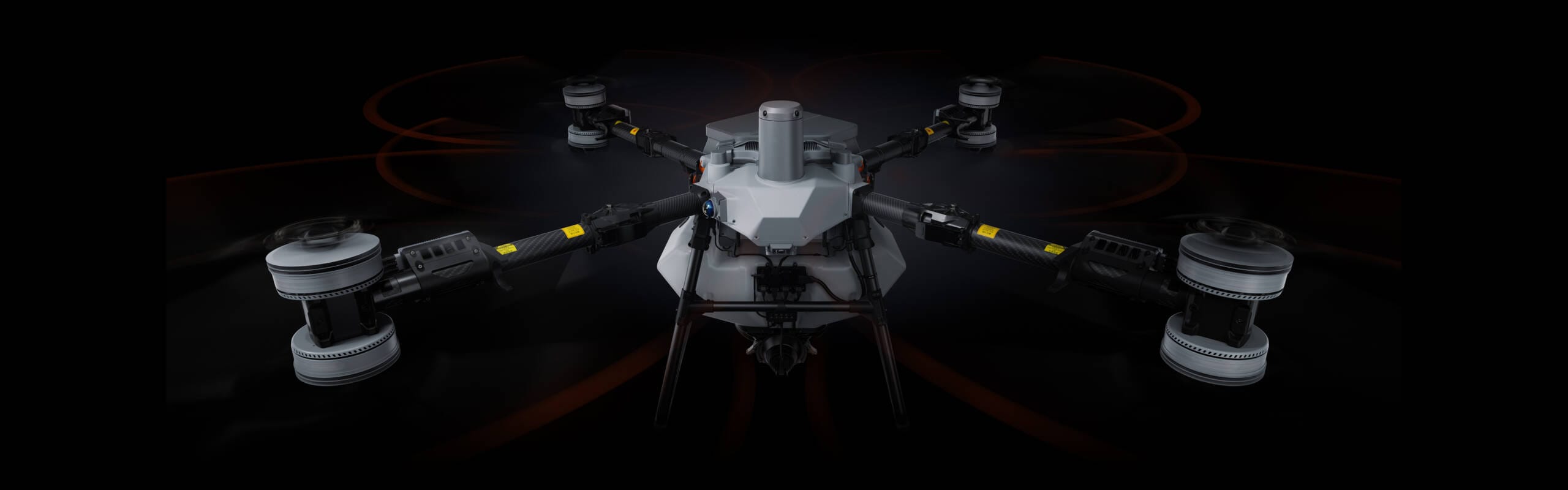 Sistema de esparcido del DJI Agras T100 en operación