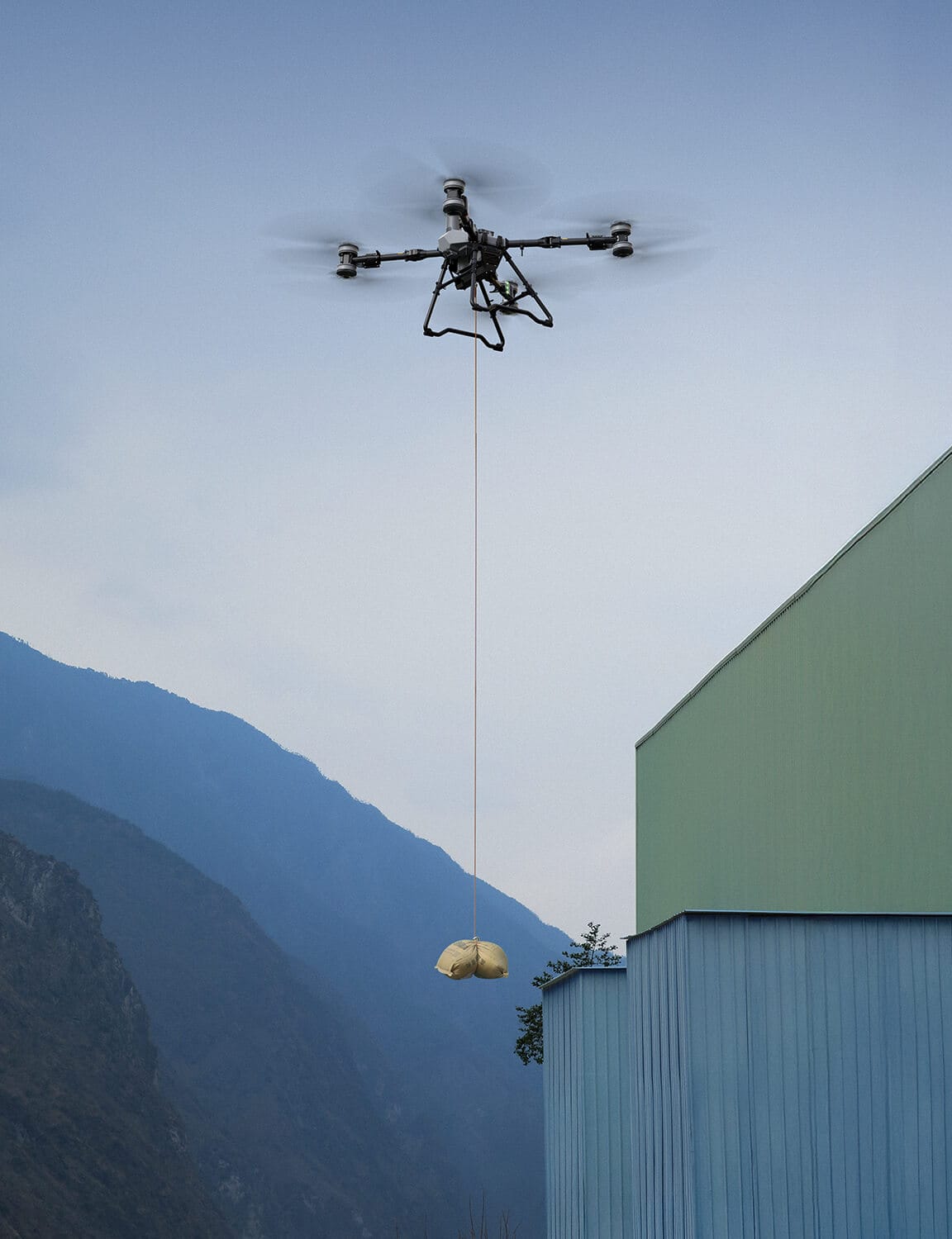 Transporte de materiales de construcción con dron T100
